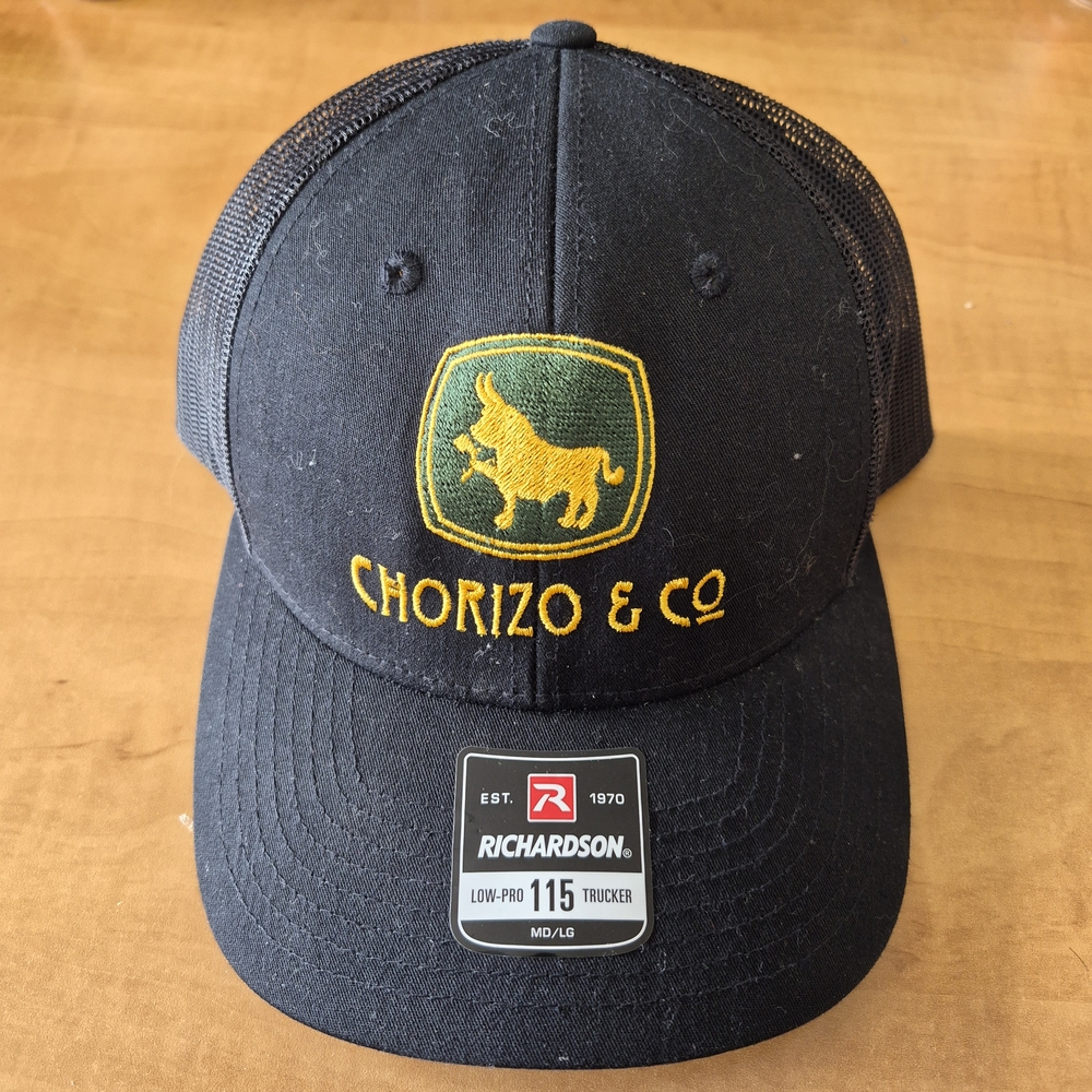 Chorizo & Co Black Trucker Hat with Yellow Embroidered Logo